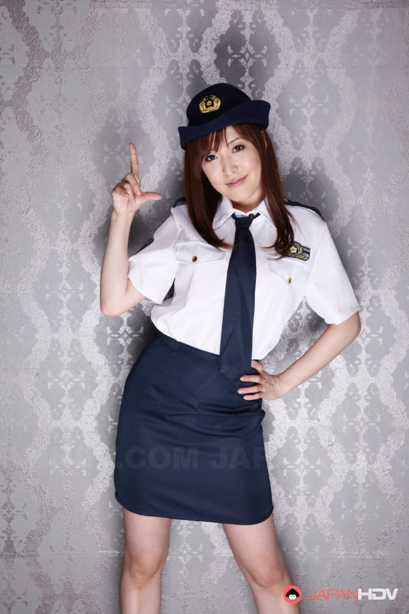 Elegant police officer Akane Satozaki shows her natural boobies