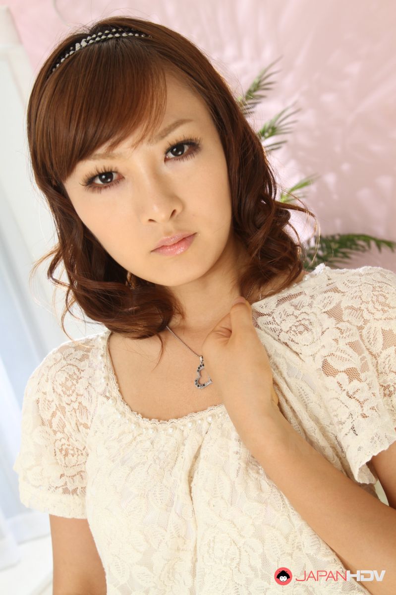 Adorable Japanese lady Fujii showing off her natural tits with pride