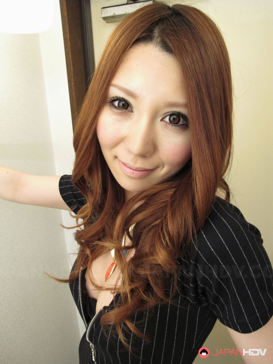 Nagisa Kazami shows big boobs and spreads labia of hairy pussy.