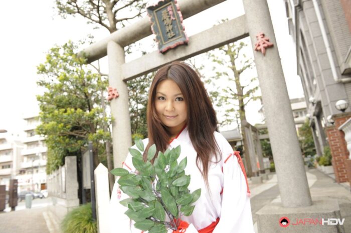 Sexy Airi Ai shows hairy pussy under short kimono for pictures.