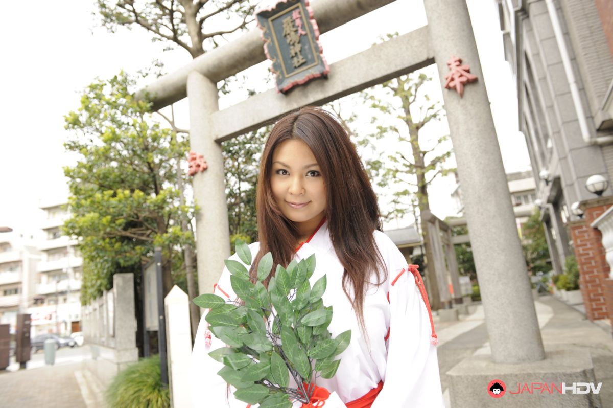 Sexy Airi Ai shows hairy pussy under short kimono for pictures.