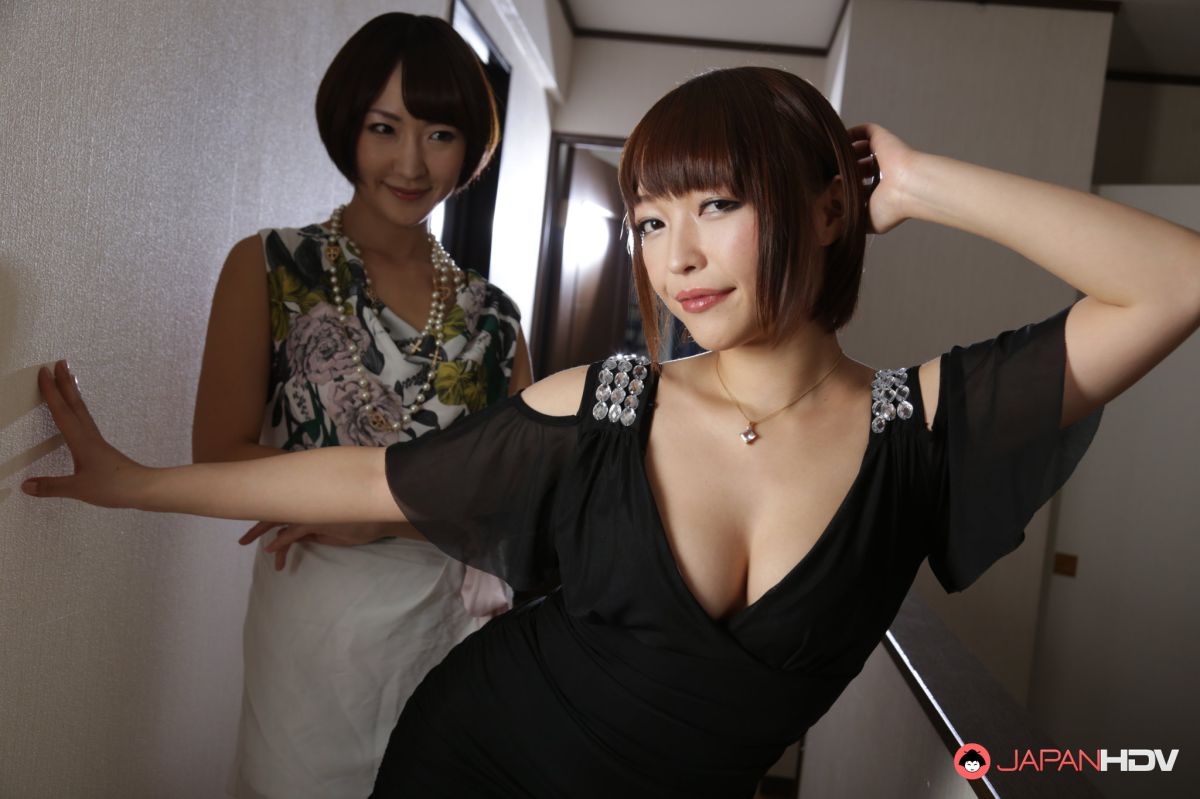 Yui Ayana gets horny and takes off her clothes in the hallway