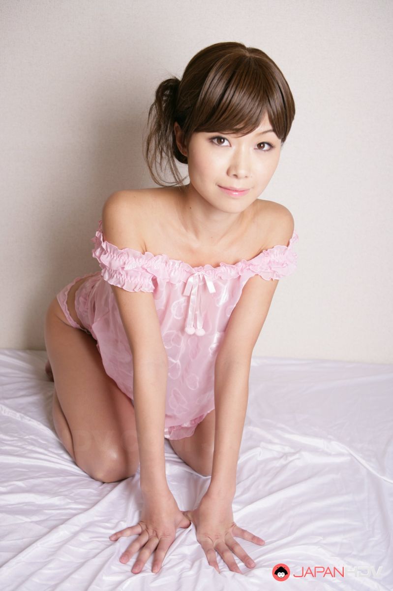 Nanako Takeuchi is so sensual in pink lingerie and she shows her tits.