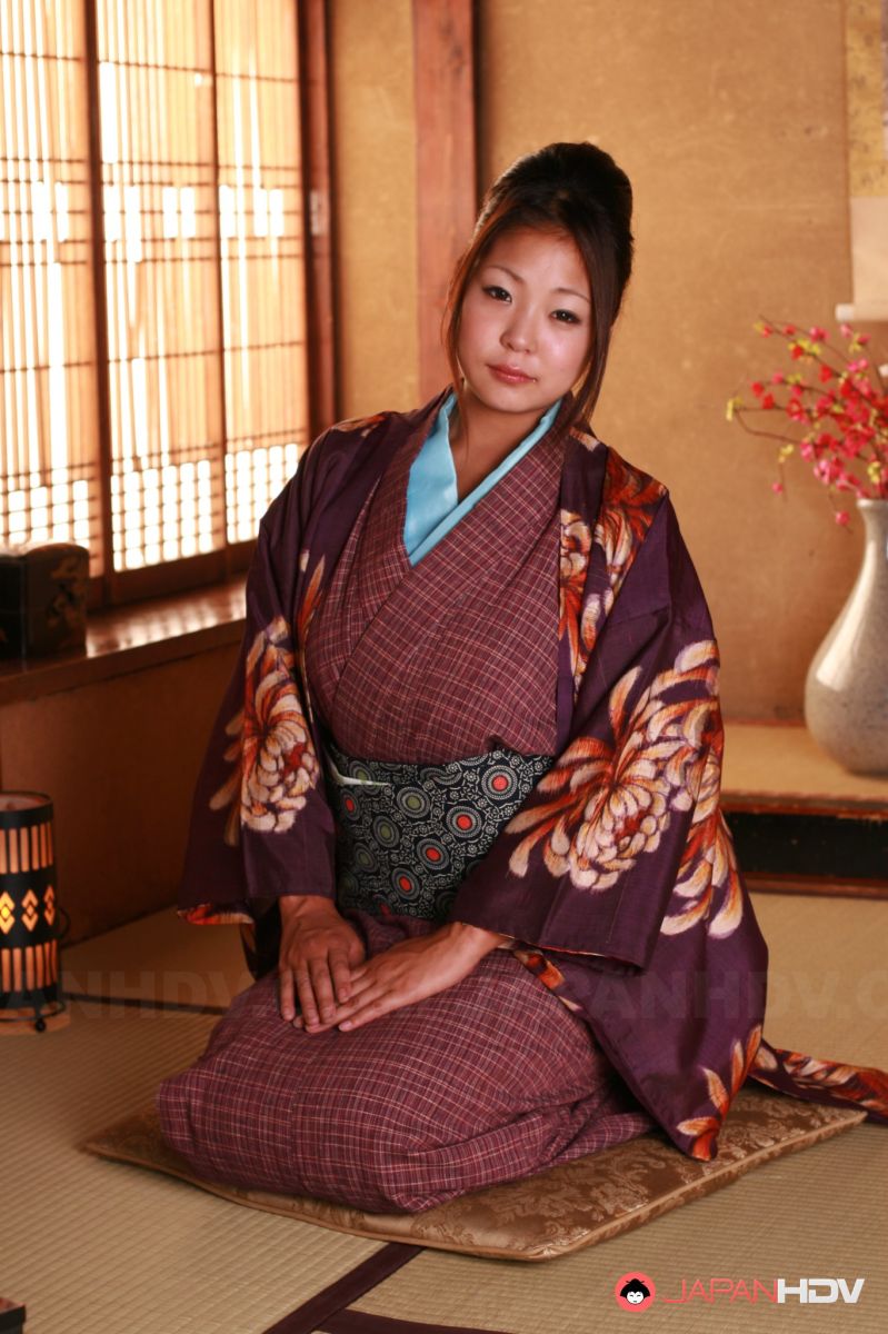 Beautiful Japanese gal shows her big naturals and that hairy twat